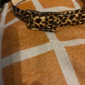 Animal printed belt. 42 inches long. 1 inches wide.